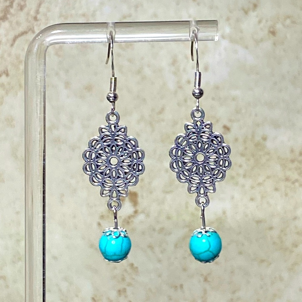Turquoise and silver tone dangle earrings